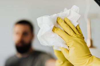 blot spilled liquid as quickly as possible using paper towel